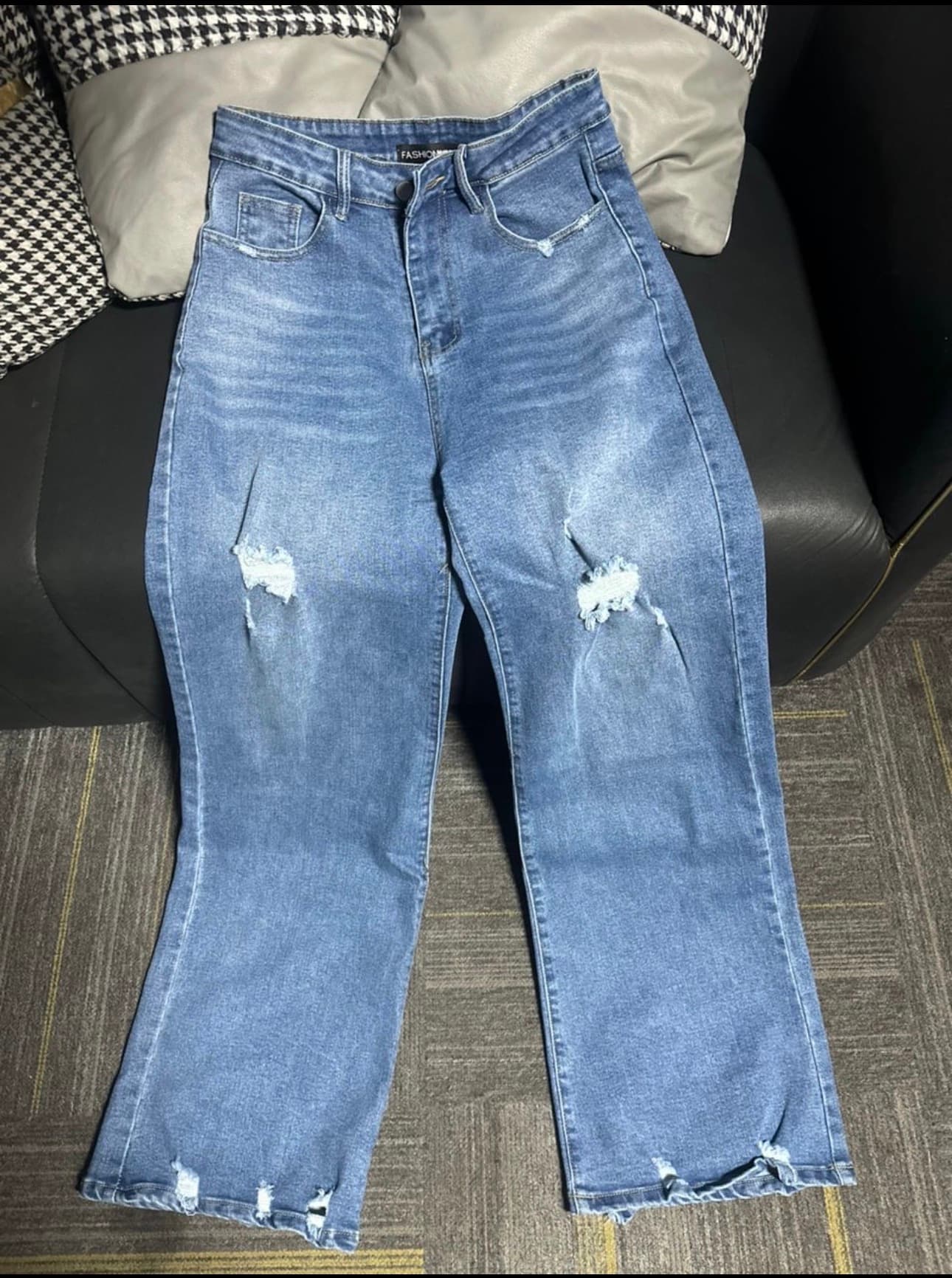 Distressed wide leg denim jeans